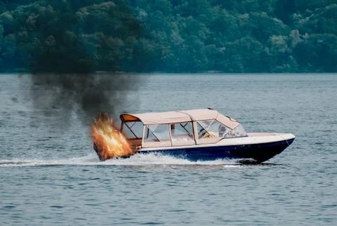 The boat is burning Stock Photos