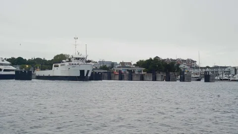 Boat in Cape Cod harbor Stock Footage 90632277