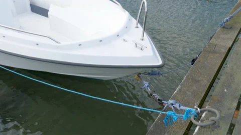 Boat chained to the pier Video stock 156265507