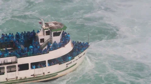Boat challenging waterfalls Stock Footage 42013047