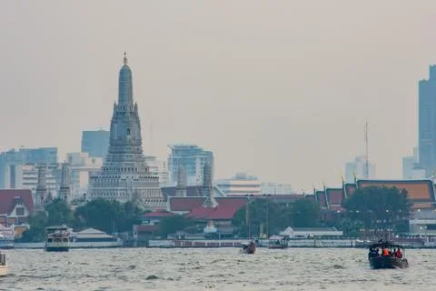 Boat in the Chao Phraya River and Wat Arun the Temple is the oldest , Famous  Stock Photos
