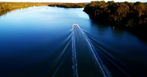 Boat Chase up river Stock Footage 77054247
