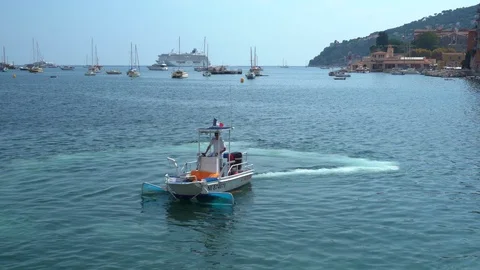 Boat cleans water - Medium shot Stock Footage 112207231