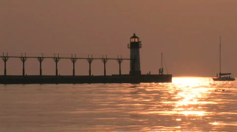 Boat coming in at sunset Stock Footage 264651