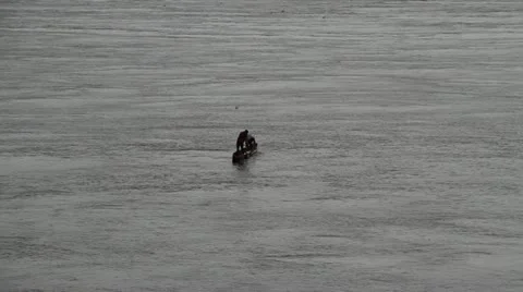 Boat on the Congo River with two men Stock Footage 21514257