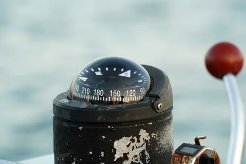  boat control engine speed knob and compass Stock Photos