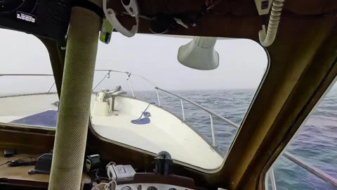 A Boat Cruises in Moderately Rough Seas, Wide Angle Pilot POV Stock Footage 288172209