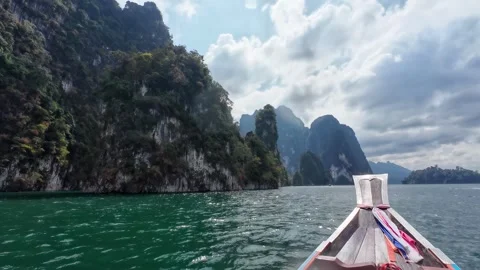 Boat Cruising Beside Limestone Formations Stock Footage 329072872