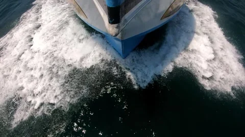 Boat cutting through waves, showcasing powerful motion and splashes Stock Footage 321741704