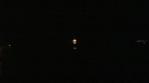 Boat decorated with lights passes Stock Footage 295352
