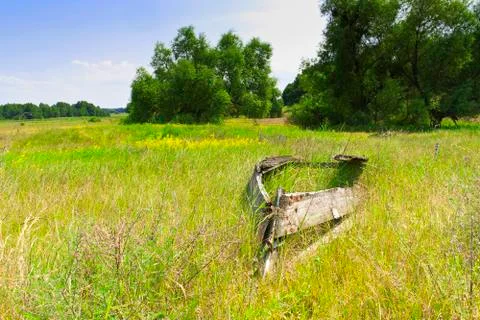Boat destroyed in the grass Stock Photos