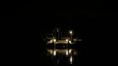 Boat dock lit at night 스톡 동영상 12555818