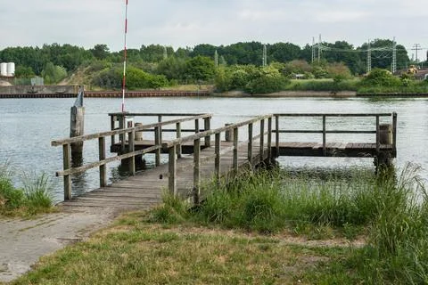 Boat dock in the river Stock Photos