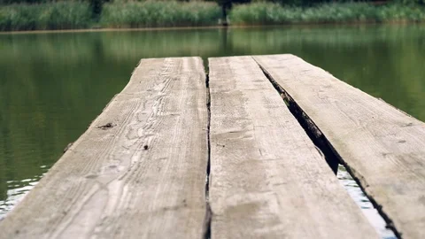 A boat dock on a small lake Stock-Footage 97140597