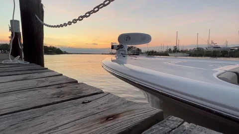 Boat docked at sunset Stock-Footage 199490392