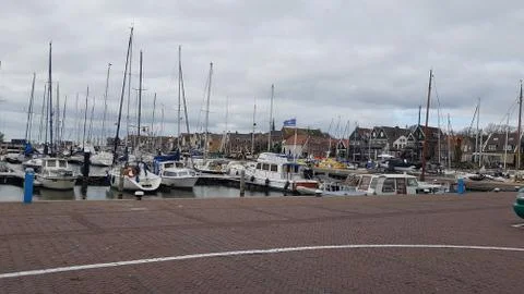 Boat docked on the wharf of fishvillage Urk, Netherlands Stock Photos