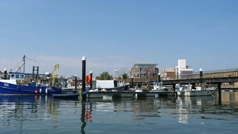 Boat docking at Lymington Quay Stock Footage 137141774