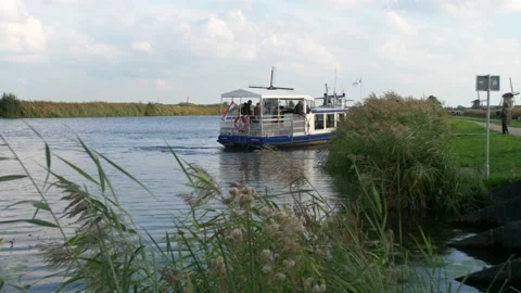 Boat docks on the shore. Slow motion 4K Stock Footage 220073563