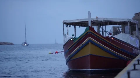 Boat on the docks at twilight Video stock 77465539