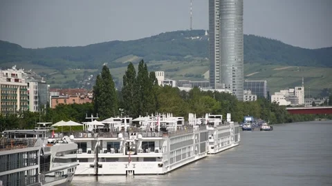 Boat at Donau, Millenium tower in Vienna - Austria Stock Footage 134985917