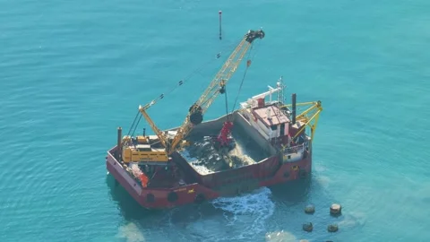 A boat is dredging the sea Stock Footage 231165426
