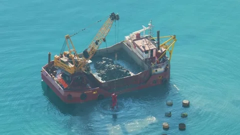 A boat is dredging the sea Stock Footage 231337276