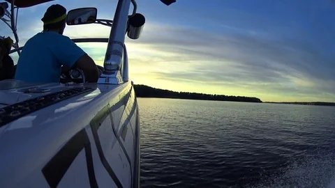 Boat Driver Standing Back View, Young people hanging out on a wakeboard Stock Footage 74849088