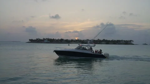 Boat drives by sunset, Florida Keys Stock Footage 157343631