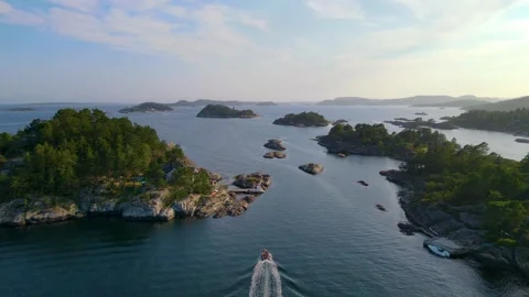 Boat Driving Between Island's 4K Areal Stock Footage 249907353