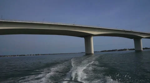 Boat Driving Underneath Bridge Video stock 63991318