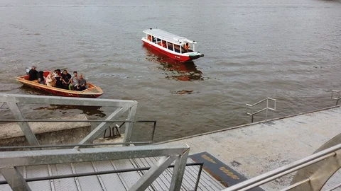 Boat dropping off passengers Stock Footage 100993501