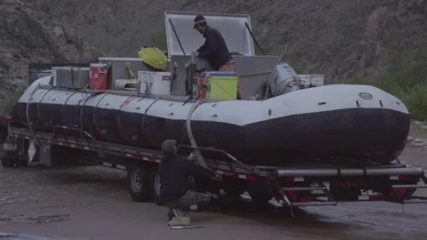 Boat with electrical resistivity equipment being loaded in the truck Stock Footage 77453296
