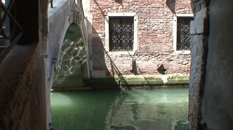 Boat Emerges from under Venice Bridge Stock Footage 1039488