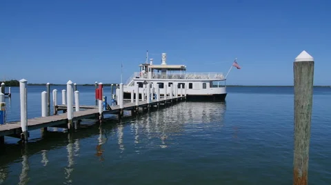 BOAT AT THE END OF A DOCK Stock Footage 63319765