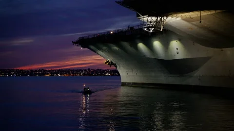 Boat Entering Dock At Sunset Stock Footage 210651628