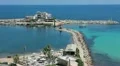Boat entering in sea bay of the city of Monastir, the Mediterranean Sea, Tunisia HD Footage