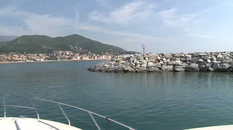Boat exiting from small port  Stock Footage 41684984