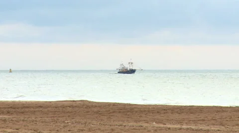 Boat fights the waves to get to port Stock Footage 55493149