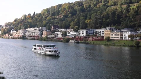 Boat filled with tourist while sailing in Neckar river in Heidelberg Stock Footage 171083201