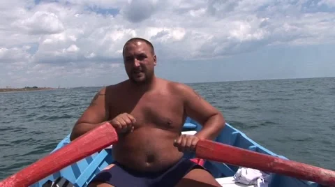 In boat fisherman rowing Stock Footage 45952124