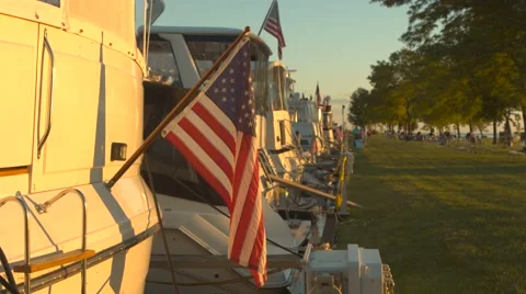 Boat Flag flying 4th of July at Sunsnet Patriotic Boating Vacation Stock Footage 48186619