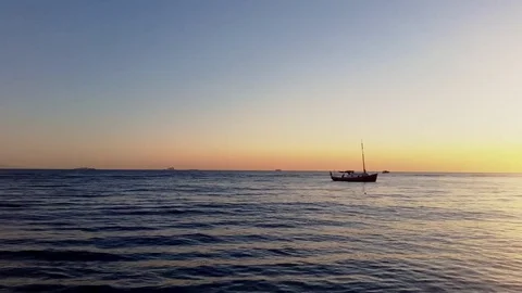 Boat floating on the calm sea Stock Footage 78972784