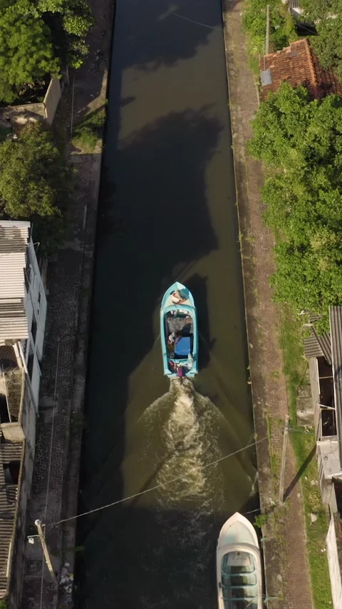 Boat floating on the canal Stock Footage 232190194