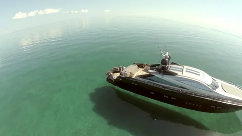 Boat floating in clear water Stock Footage 77736612