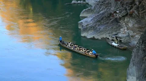 Boat Floating Down River. Stock Footage