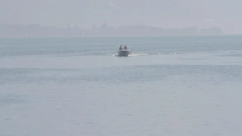 Boat is floating in the Lake Como. Video stock 127795788