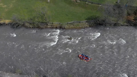 Boat floating on a mountain river. Rafting on a mountain river top view. 動画素材 123315975