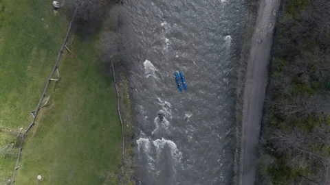 Boat floating on a mountain river. Rafting on a mountain river top view. Video stock 123316017