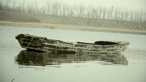 Boat floating on a river in China Stock Footage