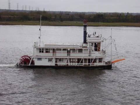 Boat floating on the river Stock Photos